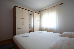 Postel nebo postele na pokoji v ubytování In Apartment