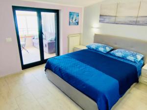Postel nebo postele na pokoji v ubytování Sognando Agropoli