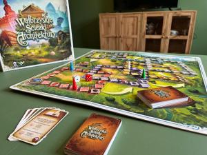 a game of walt disney world boardgame on a table at Apartament Stary Zdrój in Wałbrzych