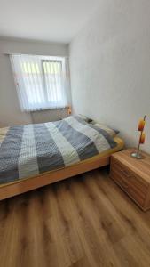 Postel nebo postele na pokoji v ubytování Ferienwohnung an der Prodalp Talstation