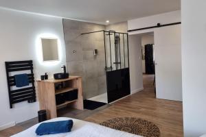 Postel nebo postele na pokoji v ubytování Le P'tit Indus , Duplex