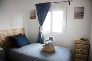 Кровать или кровати в номере Casa de Almano - Torremolinos direct on beach
