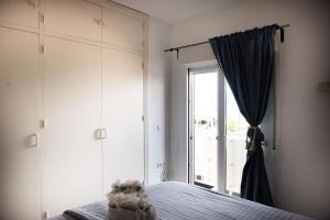 Кровать или кровати в номере Casa de Almano - Torremolinos direct on beach