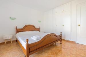 Postel nebo postele na pokoji v ubytování WELCS DUPLEX 025 EMP frente al Mar