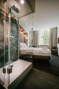 Postel nebo postele na pokoji v ubytování Travel24 Hotel Leipzig City