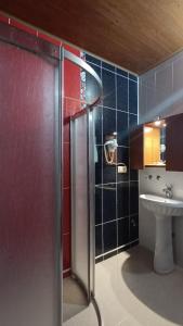 a bathroom with a shower and a sink at Uzungol Soylu Hotel in Uzungöl +104 photos
