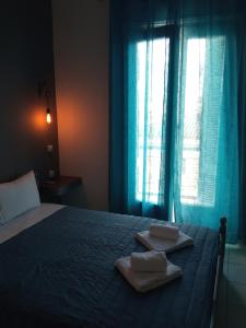 Voodi või voodid majutusasutuse Hotel Theoxenia toas