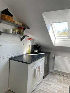 Moderne Wohnung in Bielefeld/Ummeln tesisinde mutfak veya mini mutfak