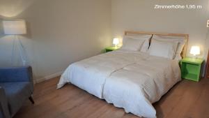 Una cama o camas en una habitación de flueli holiday home urnaesch