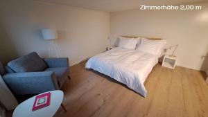 Una cama o camas en una habitación de flueli holiday home urnaesch