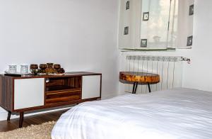 Postel nebo postele na pokoji v ubytování N'konak Guesthouse