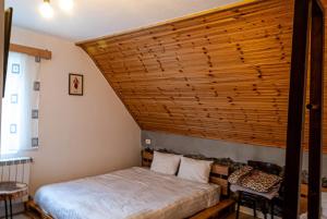 Postel nebo postele na pokoji v ubytování N'konak Guesthouse