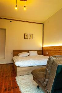 Postel nebo postele na pokoji v ubytování N'konak Guesthouse