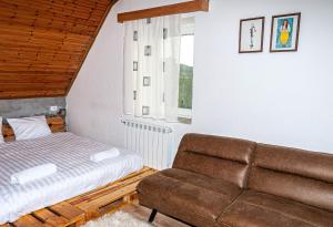 Postel nebo postele na pokoji v ubytování N'konak Guesthouse