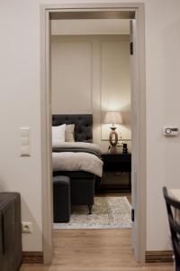 Ένα ή περισσότερα κρεβάτια σε δωμάτιο στο Vaksali Apartment!