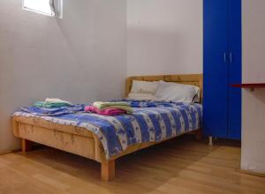 a bedroom with a bed with towels on it at Villa Horizon Canj in Čanj