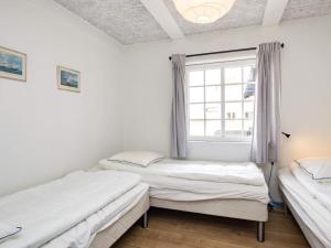 Postel nebo postele na pokoji v ubytování Holiday home Marstal V