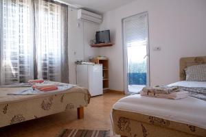 Postel nebo postele na pokoji v ubytování Villa Horizon Canj