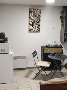 Kuchyň nebo kuchyňský kout v ubytování Chambre entrée indépendante