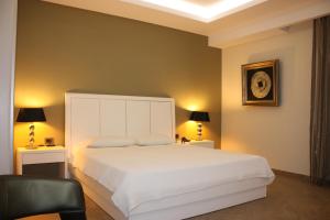 Posteľ alebo postele v izbe v ubytovaní Hotel Cariatis