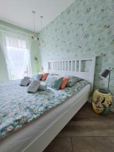 Posteľ alebo postele v izbe v ubytovaní Apartament Sun House SAUNA KOMINEK SKRZYCZNE