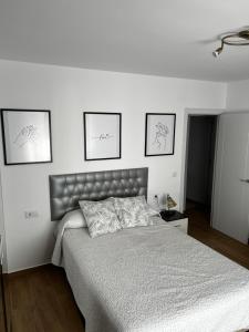 Posteľ alebo postele v izbe v ubytovaní Apartamento Arenas