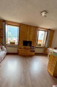 TV a/nebo společenská místnost v ubytování Nel Cuore di Ponte