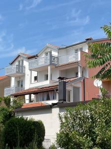 a building with balconies on the side of it at B&B Sea Joy Rovinj in Rovinj