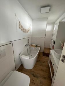 Koupelna v ubytování Neubau-Apartment Naturoase