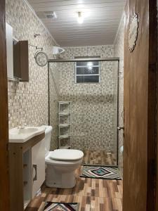 Ένα μπάνιο στο Casa de Campo Refúgio Jaguary