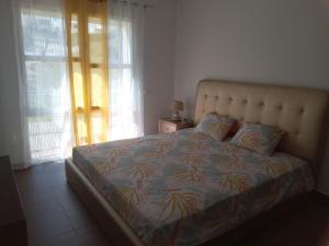 Postel nebo postele na pokoji v ubytování IBAIA maison d'hôte