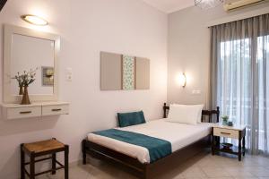 Voodi või voodid majutusasutuse Evaggelia rental apartments toas