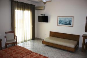 Posteľ alebo postele v izbe v ubytovaní Hotel Cariatis
