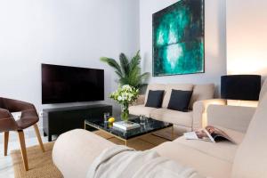 Et tv og/eller underholdning på San Buenaventura Apartment 3 + 11 billeder