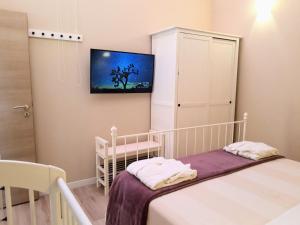 Postel nebo postele na pokoji v ubytování Villa Aurelia