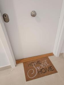 a welcome mat in front of a door at Ocean in Orio