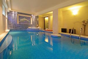 The swimming pool at or close to Olympus Mediterranean Boutique Hotel
