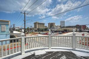 a view of a city from a balcony at Sugar's INN Room #6 King Bed in Galveston