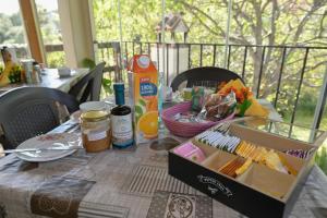 a table with a box of food on top of it at B&B Su Neulagi in Triei