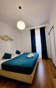 En eller flere senger på et rom på Apartments Miljas 2