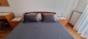 Postel nebo postele na pokoji v ubytování Apartment A&M