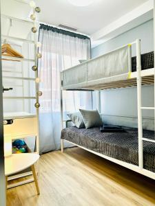 Łóżko lub łóżka w pokoju w obiekcie Welcome & Bienvenido a Santa Pola Apartamento a 30 metros de la Gran Playa