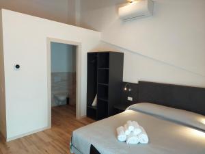 Postel nebo postele na pokoji v ubytování IL VITIGNO