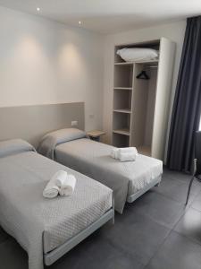 Postel nebo postele na pokoji v ubytování IL VITIGNO