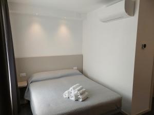 Postel nebo postele na pokoji v ubytování IL VITIGNO