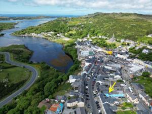 an aerial view of a town next to a river at Property 444 - Clifden in Clifden