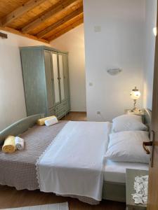 Кровать или кровати в номере Apartment Jukica 2 - 4 persons