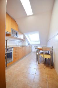 Kuchyňa alebo kuchynka v ubytovaní GALIHOST - Céntrico apartamento con parking en Cambados