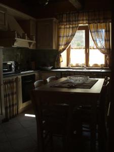 Kuchyň nebo kuchyňský kout v ubytování Agriturismo il Tiglio