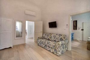 A television and/or entertainment centre at San marco elegant apartment